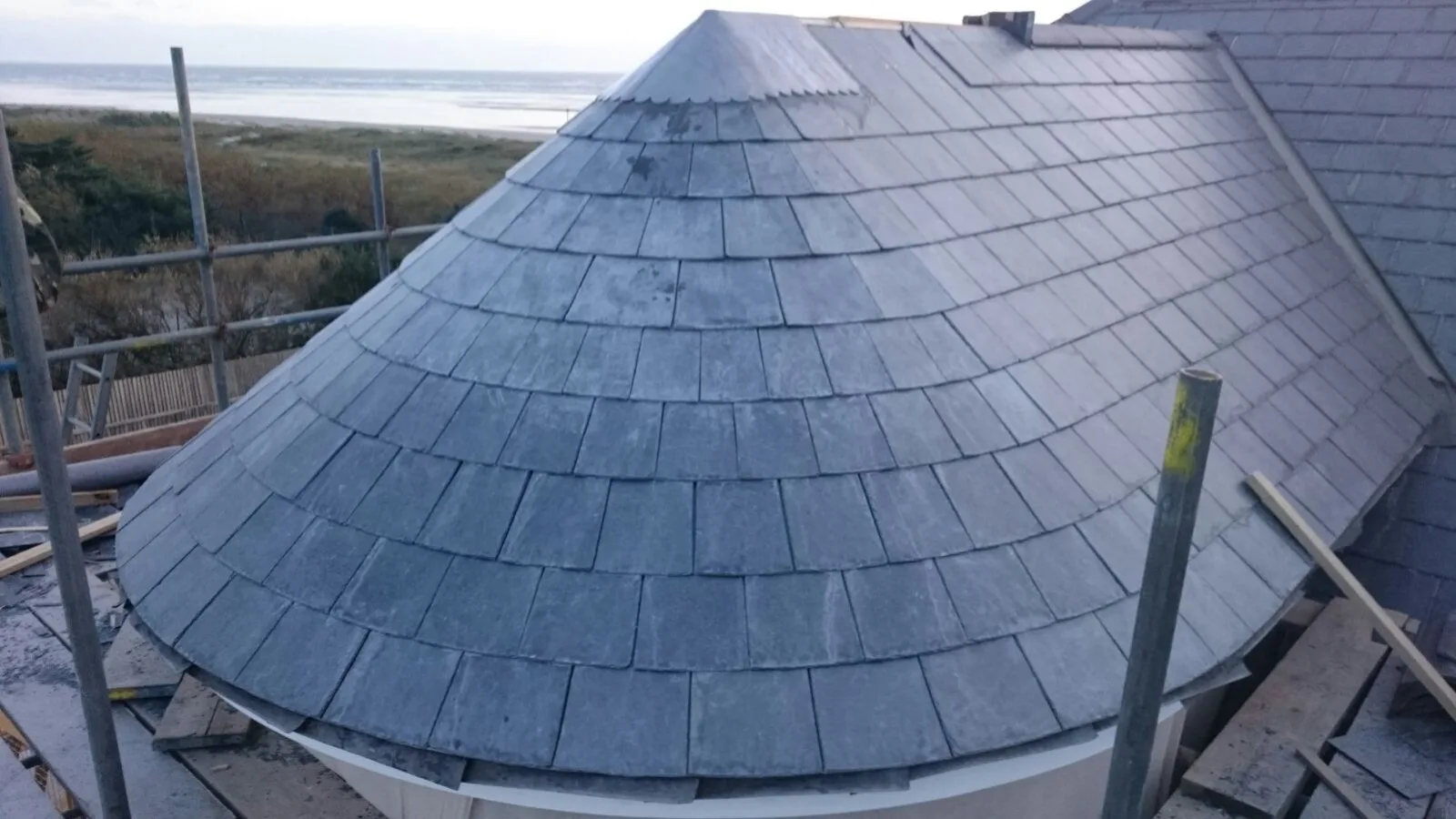 Hand-laid natural slate conical turret roof on a coastal Hampshire period property